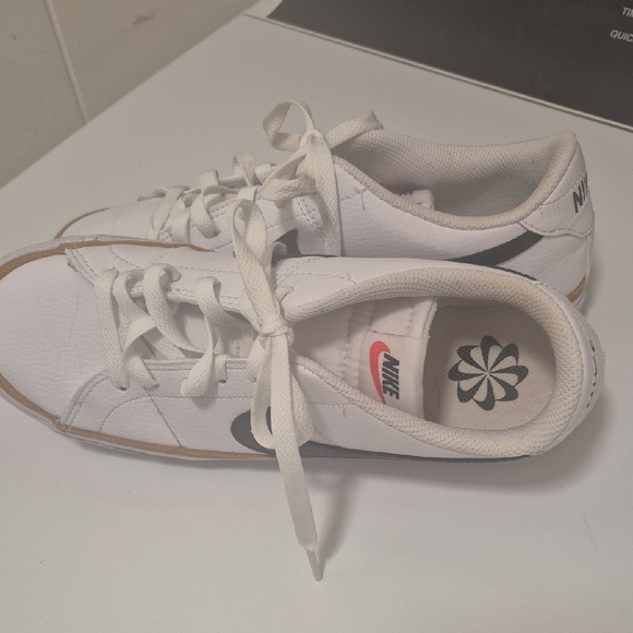 Nike Shoes - Nike Women's White and Black Sneakers 7.5